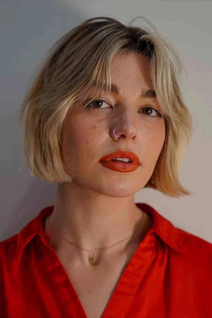 Photo showing razor cut, with the hairstyle clearly visible.