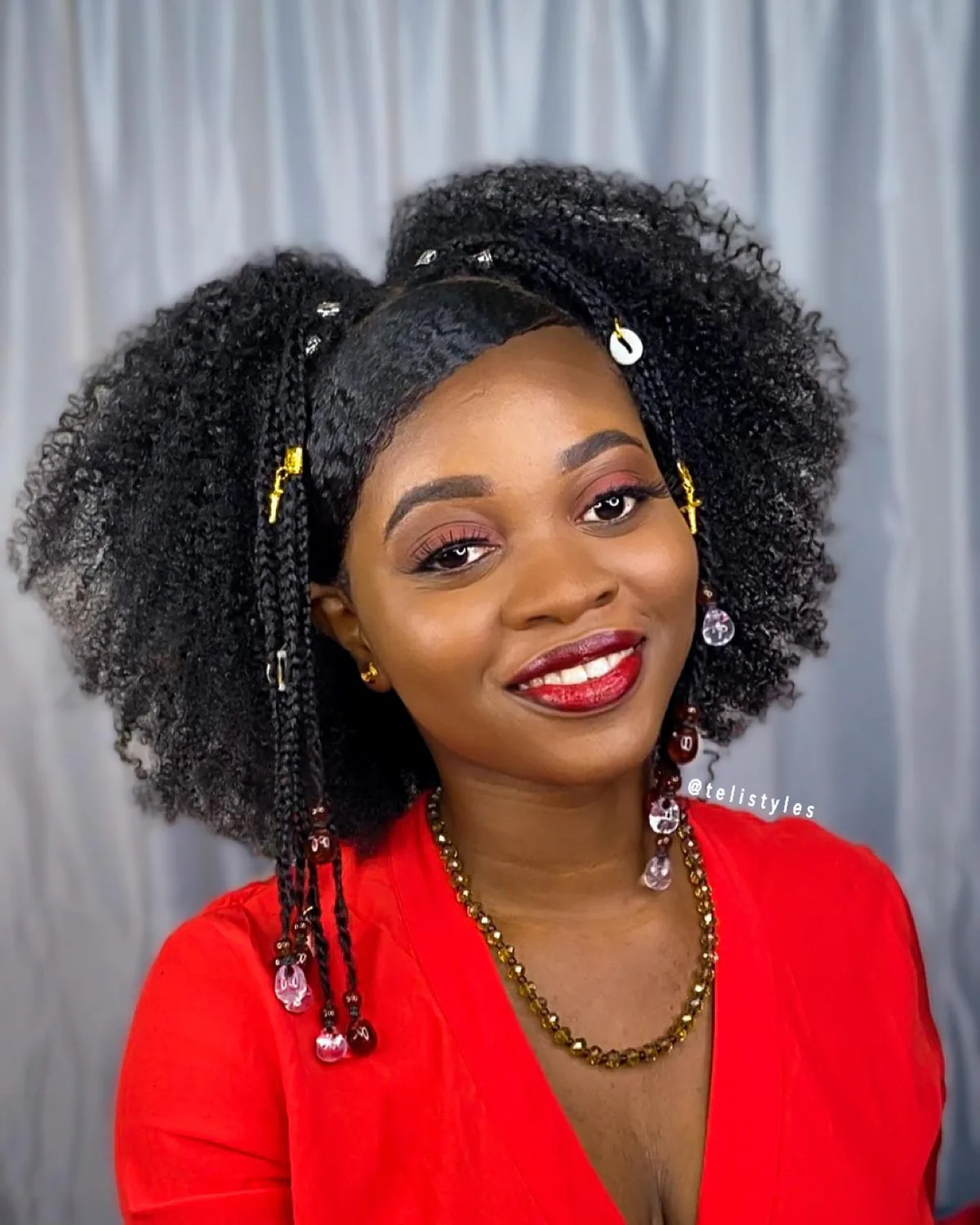 ear coily black accessory style shown as a short natural hairstyles for black women over 50 idea