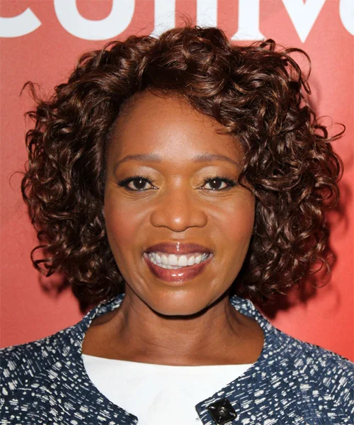 ear curly black bob shown as a short natural hairstyles for black women over 50 idea