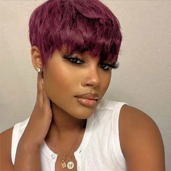 ear coily black pixie with side swept fringe shown as a short pixie cut ideas idea, featuring volume through the low volume