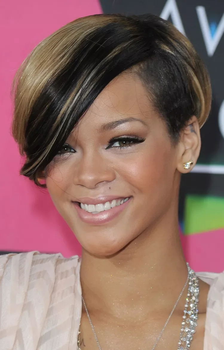 ear coily black pixie with side swept fringe shown as a short pixie cut ideas idea, featuring black color