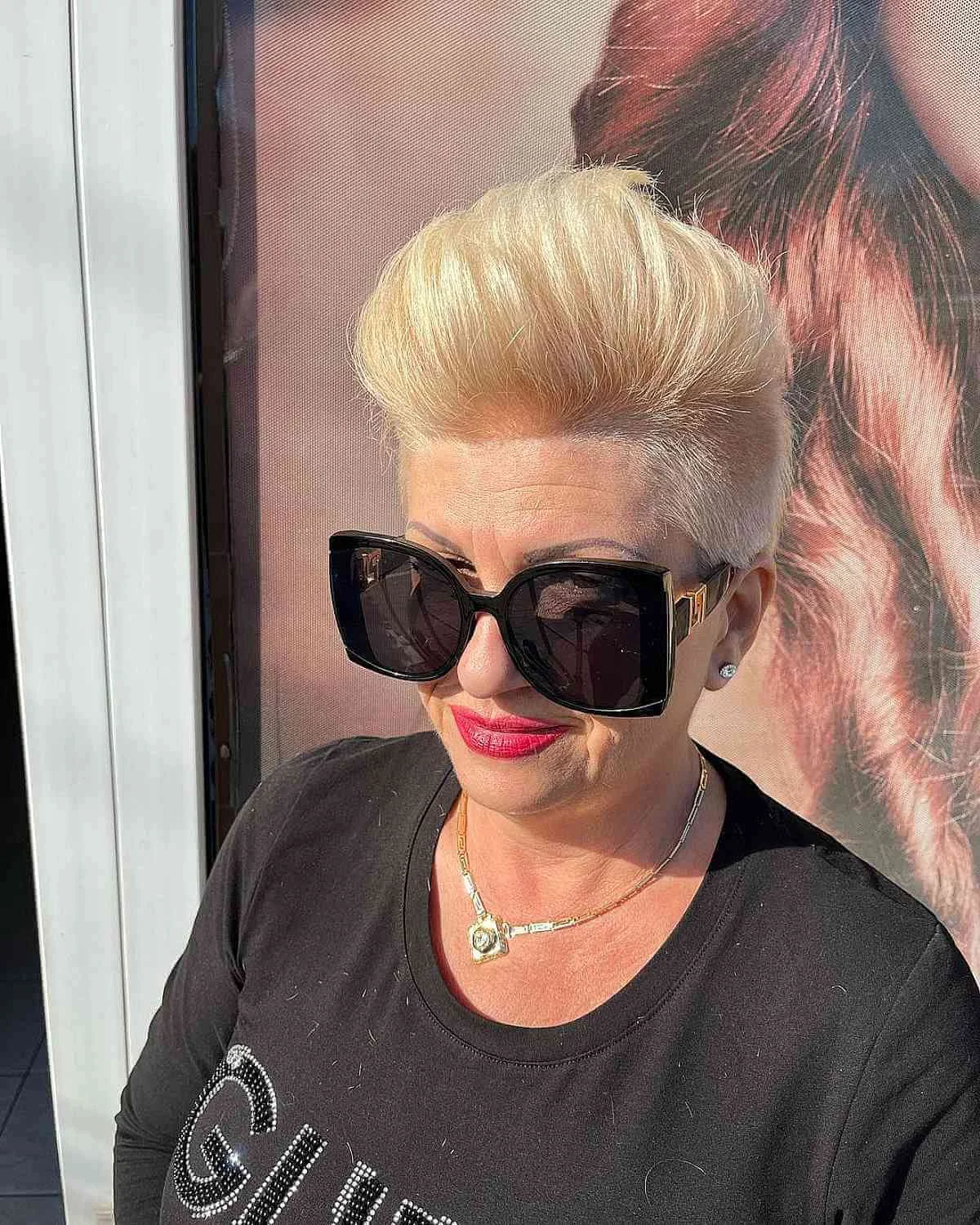 ear straight blonde pixie with side swept fringe shown as a short pixie haircuts for older women idea, featuring sleek finish