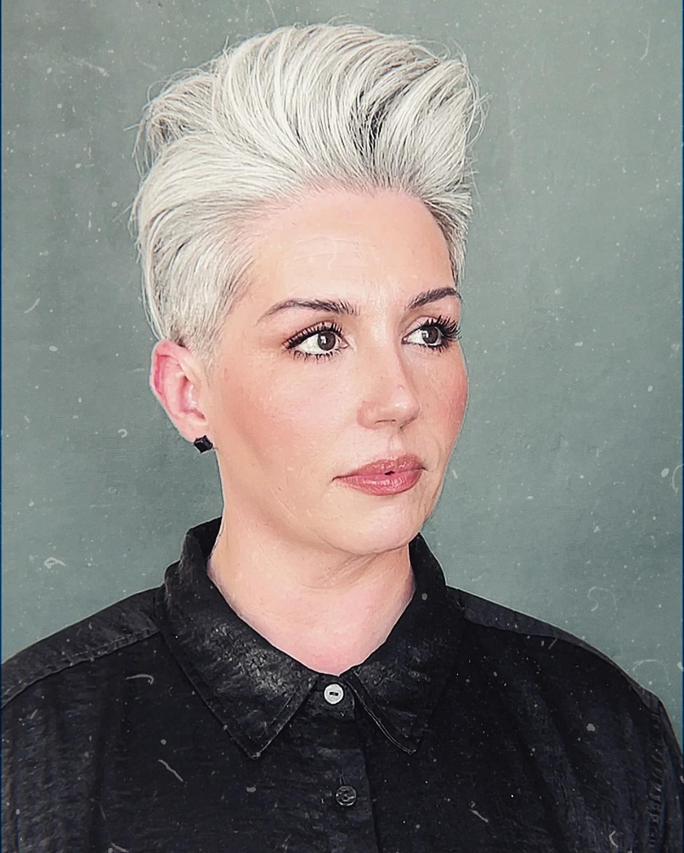 ear straight blonde pixie with side swept fringe shown as a short pixie haircuts for older women idea, featuring volume through the crown