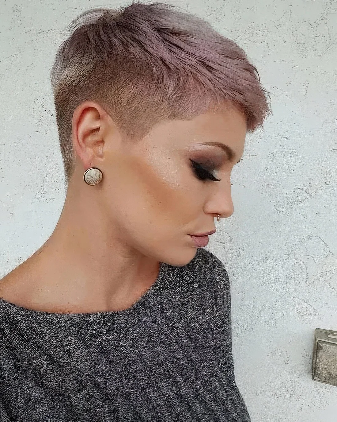Lilac short pixie with an undercut.