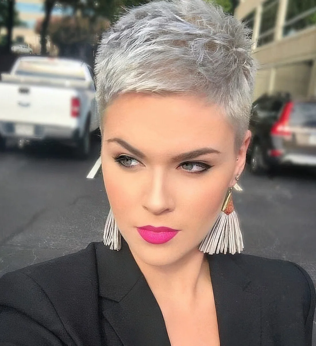 Photo showing silver short pixie haircut, with the hairstyle clearly visible.