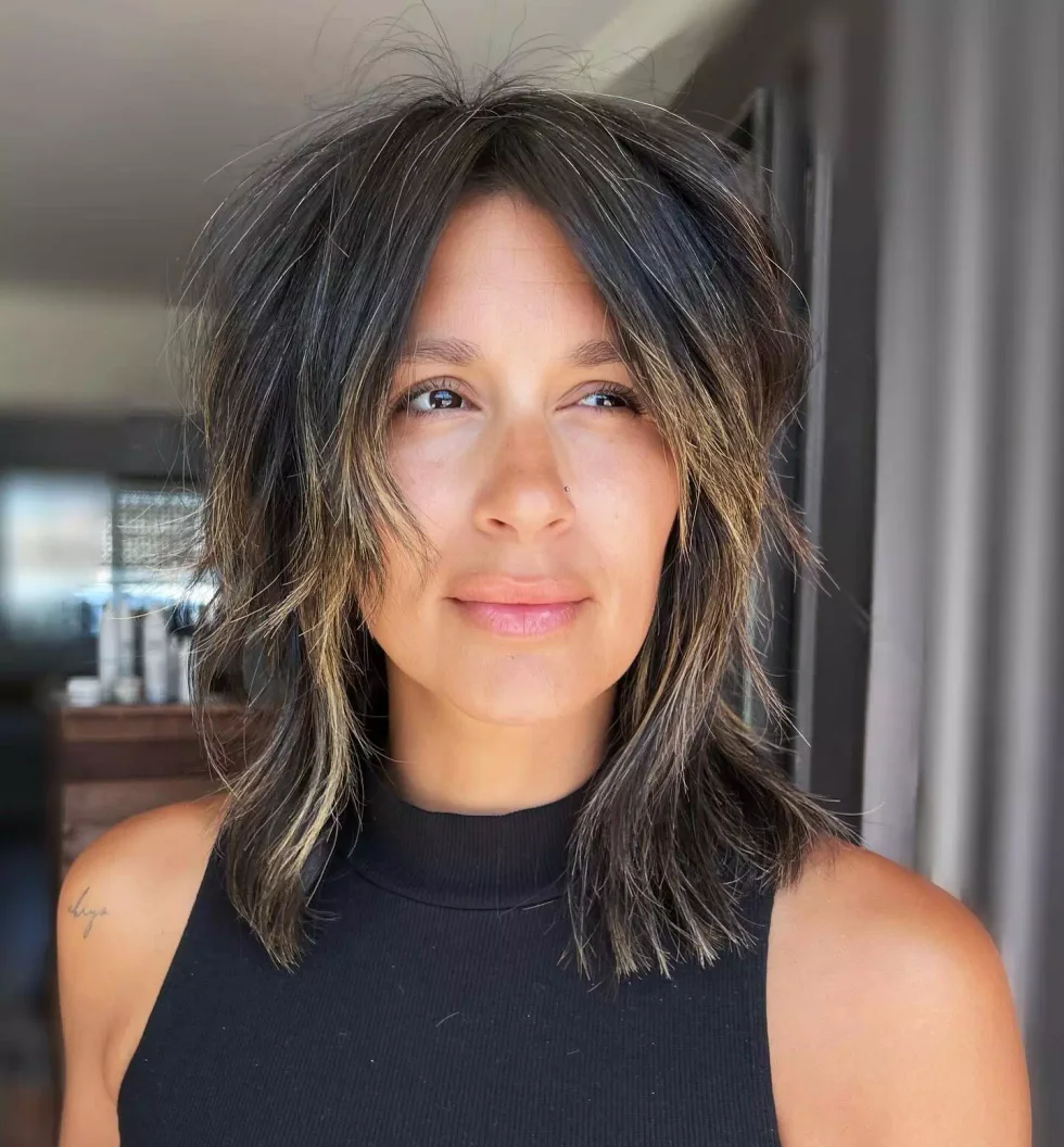 shoulder straight black shag with micro fringe shown as a short wolf curtain bangs idea