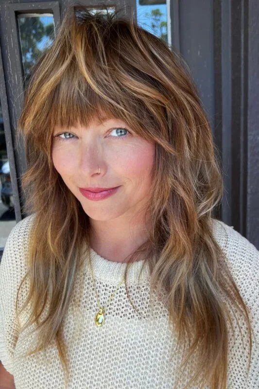 shoulder wavy chestnut lob shown as a shoulder length hairstyles for thin fine hair idea, featuring chestnut color, shown in wispy curtain bangs with long layers