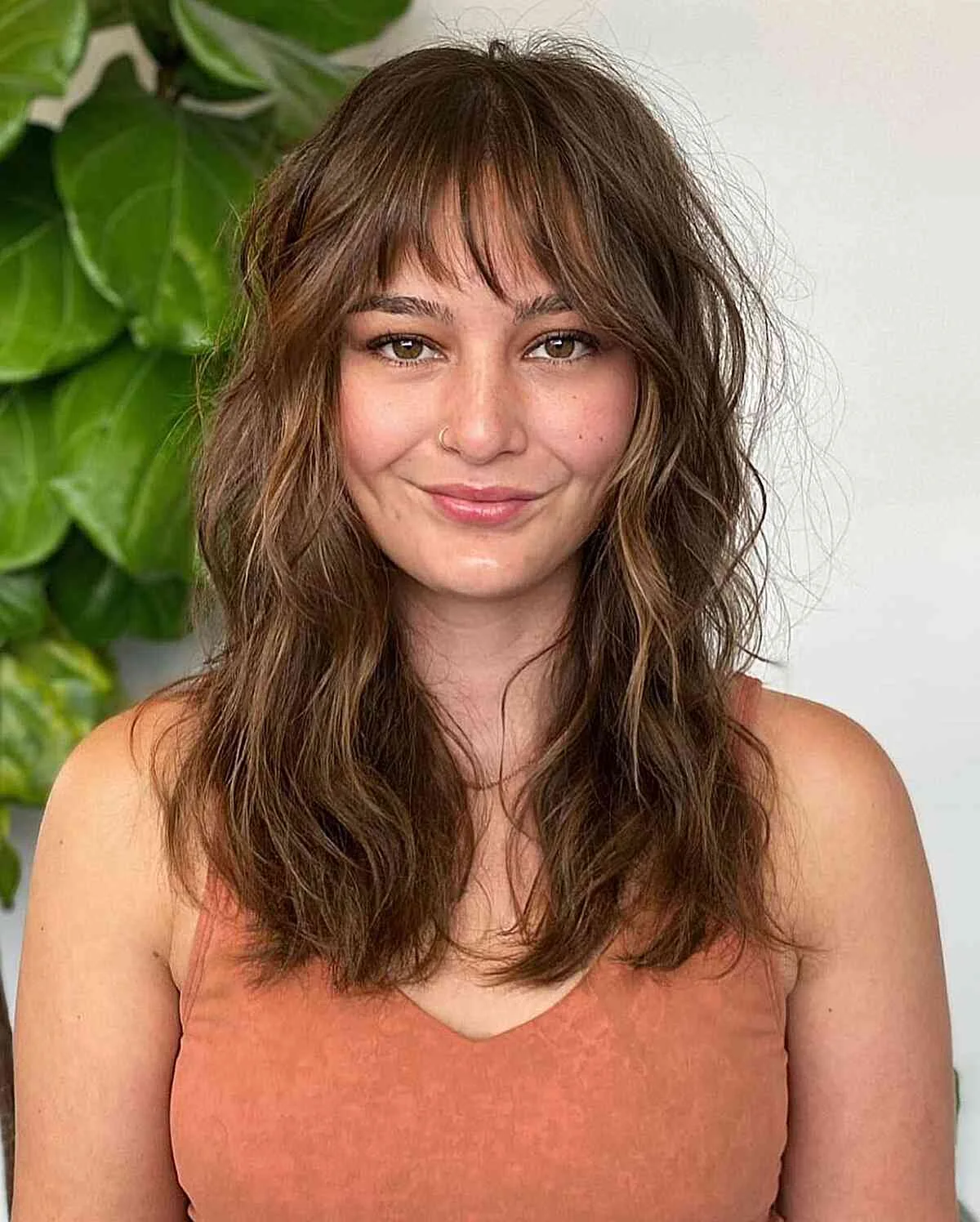 shoulder wavy chestnut lob shown as a shoulder length hairstyles for thin fine hair idea, featuring wavy texture, shown in shaggy shoulder layers with bangs