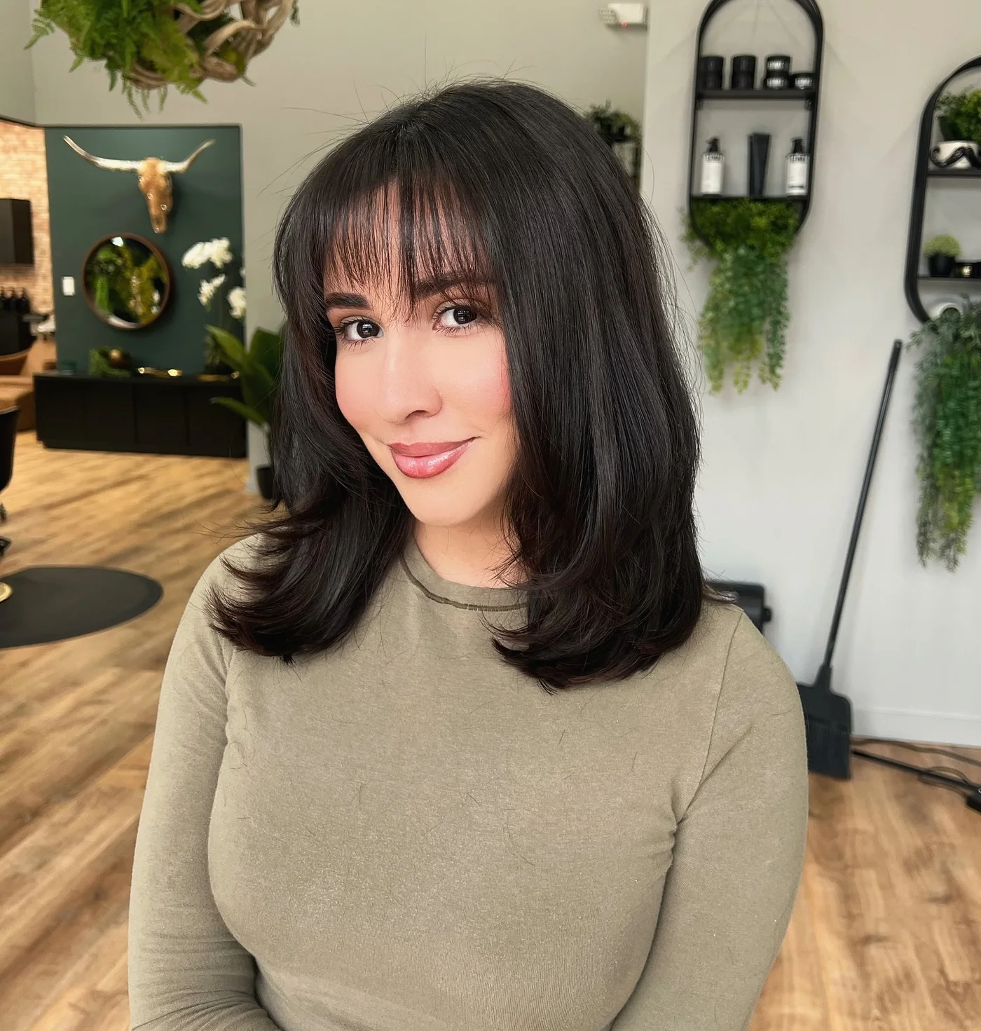 shoulder wavy chestnut lob shown as a shoulder length hairstyles for thin fine hair idea, featuring wavy texture, shown in sleek lob with full bangs