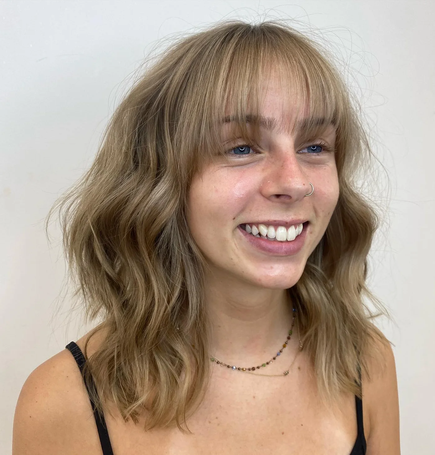 shoulder wavy chestnut lob with curtain fringe shown as a shoulder length hairstyles for thin fine hair idea