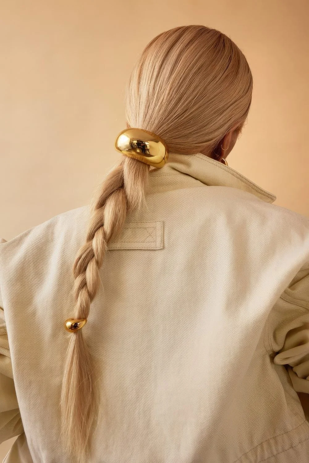 Photo showing braid with cuffs, with the hairstyle clearly visible.