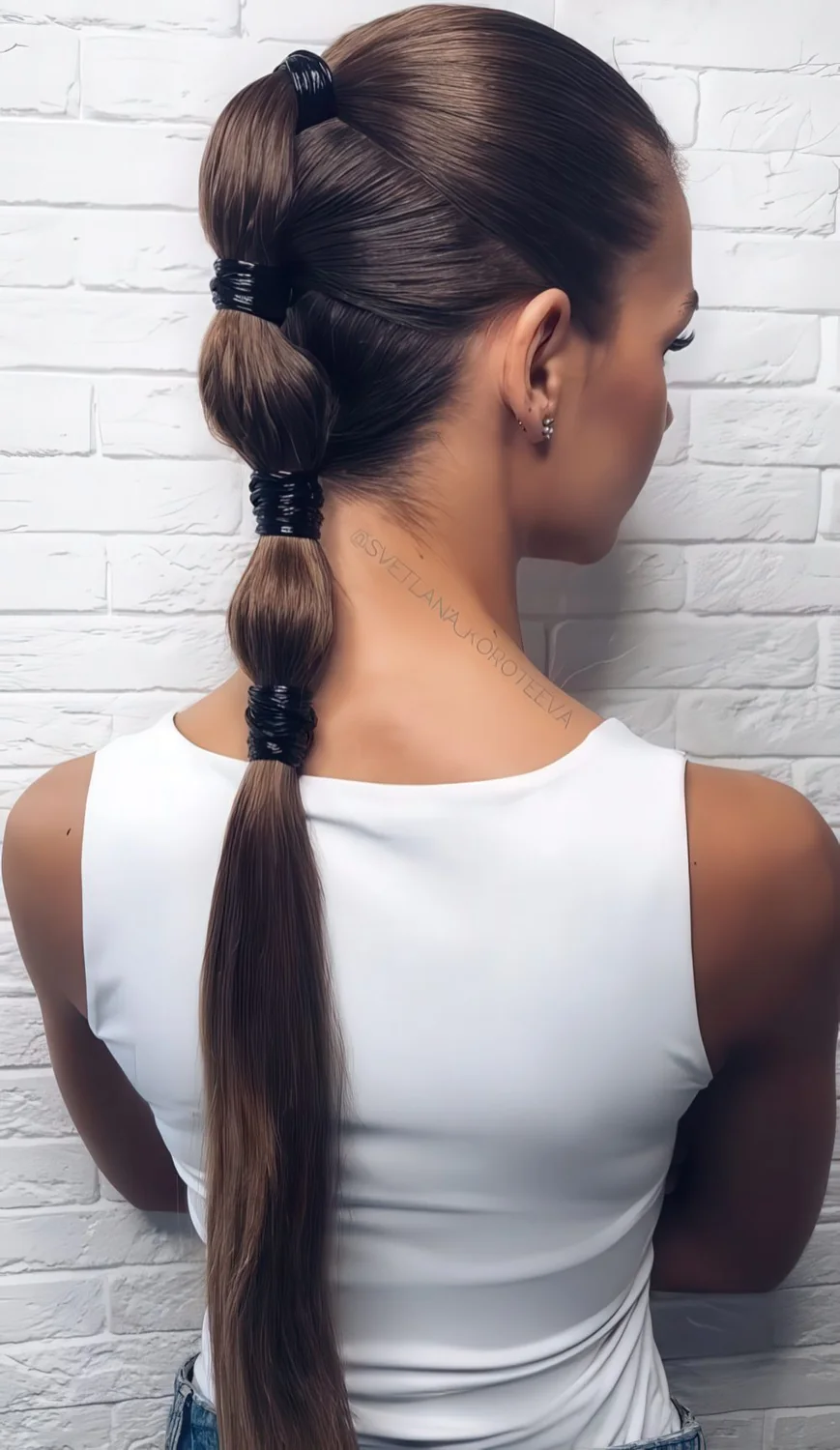 Photo showing bubble pony with braid, with the hairstyle clearly visible.