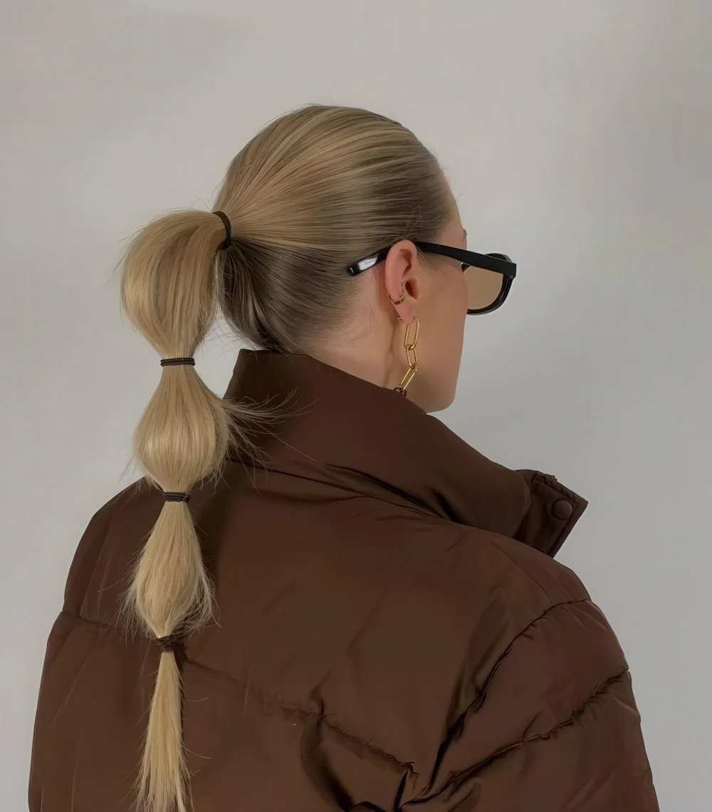 Photo showing casual bubble braid, with the hairstyle clearly visible.