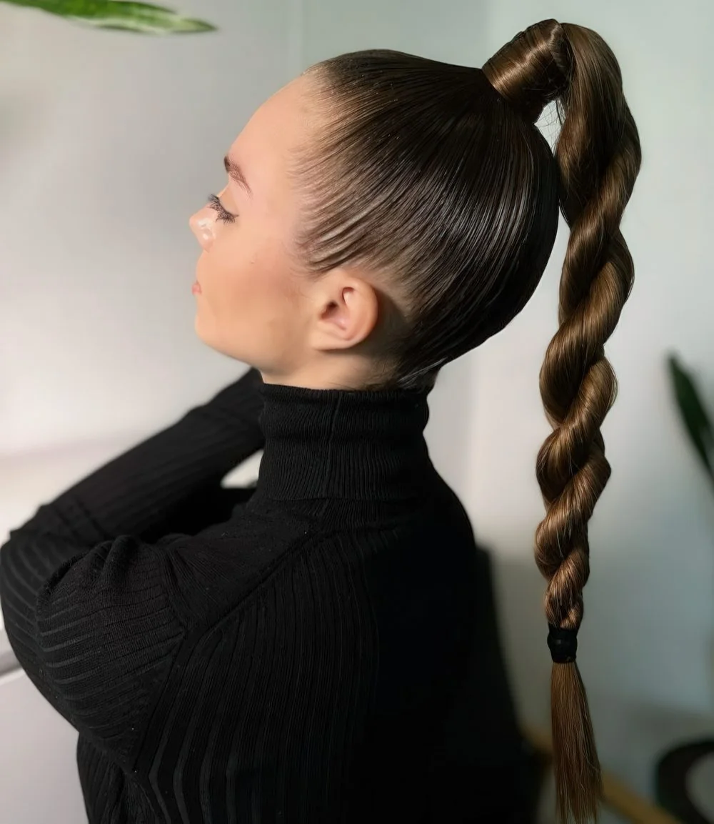 Photo showing very high twisted braid, with the hairstyle clearly visible.