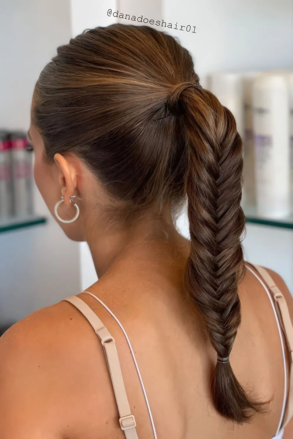 Photo showing pony fishtail braid, with the hairstyle clearly visible.