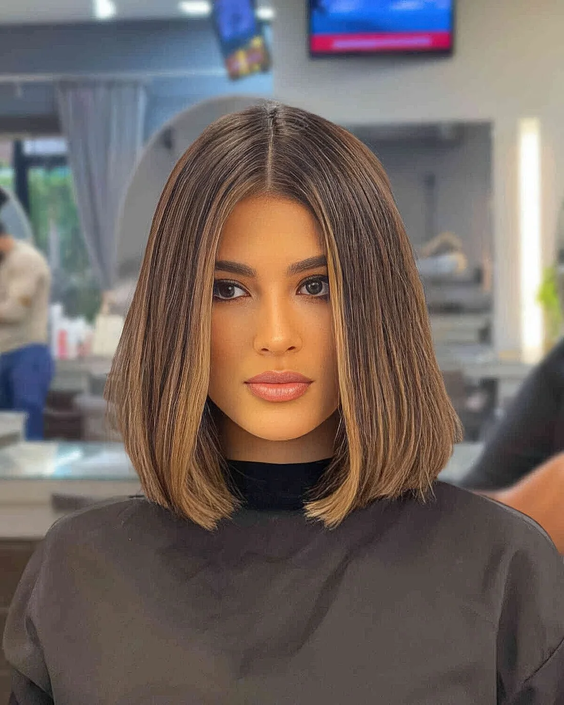Photo showing caramel balayage hairstyle, with the hairstyle clearly visible.