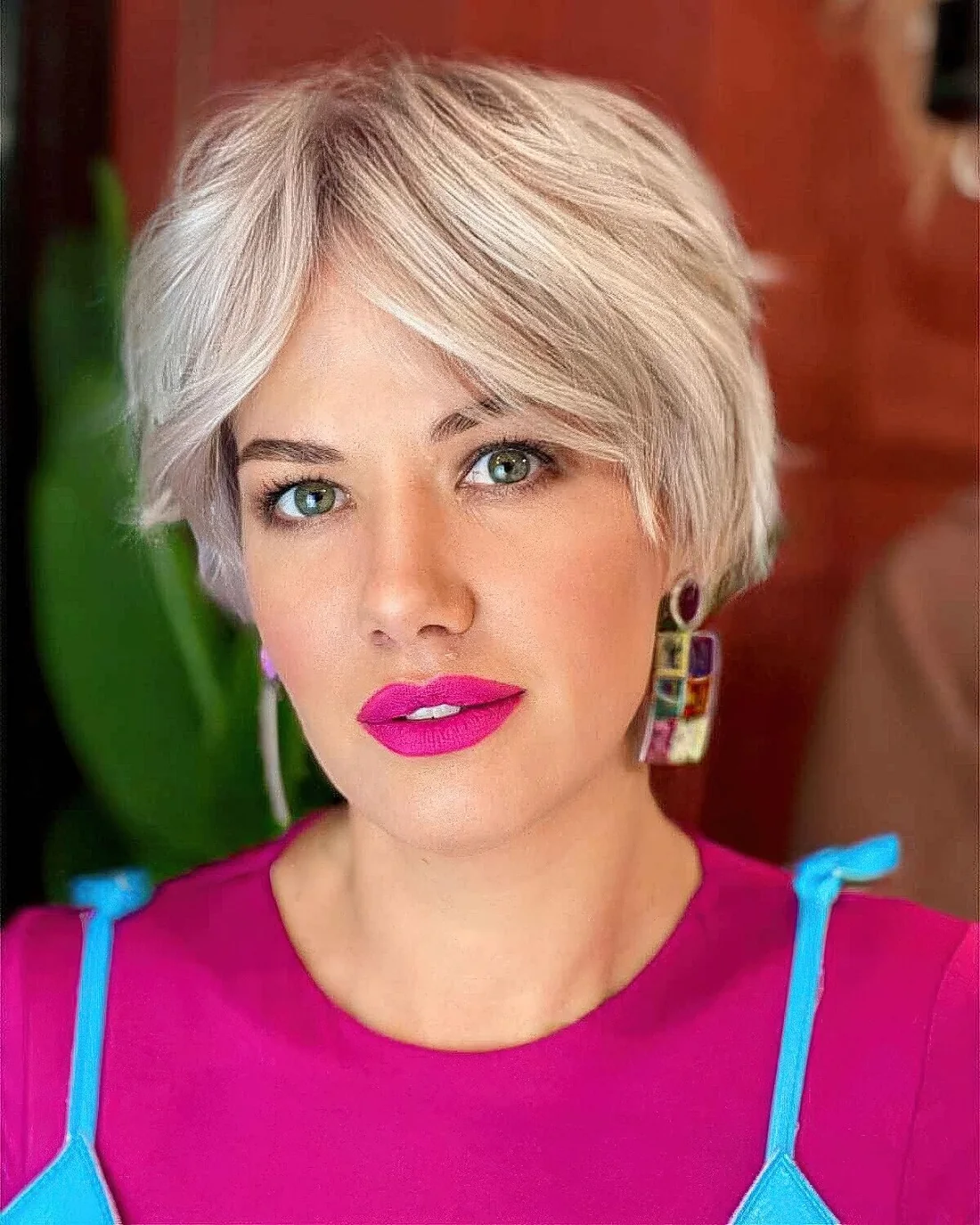 Photo showing icy blonde short hairstyle, with the hairstyle clearly visible.