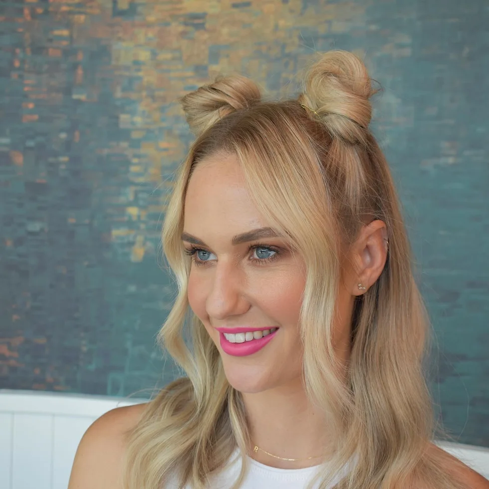 chest wavy blonde half up shown as a space buns idea
