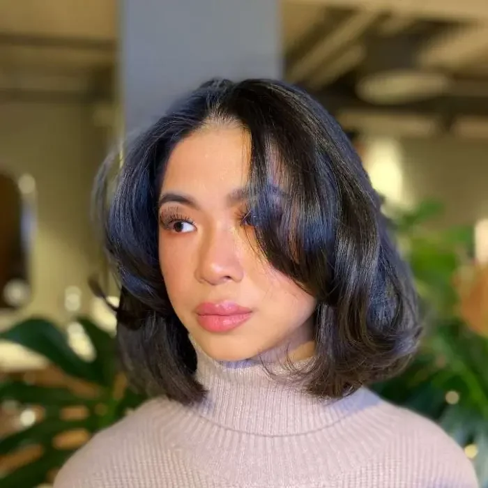 chin wavy chestnut bob shown as a textured bob for thin hair idea, featuring sleek finish