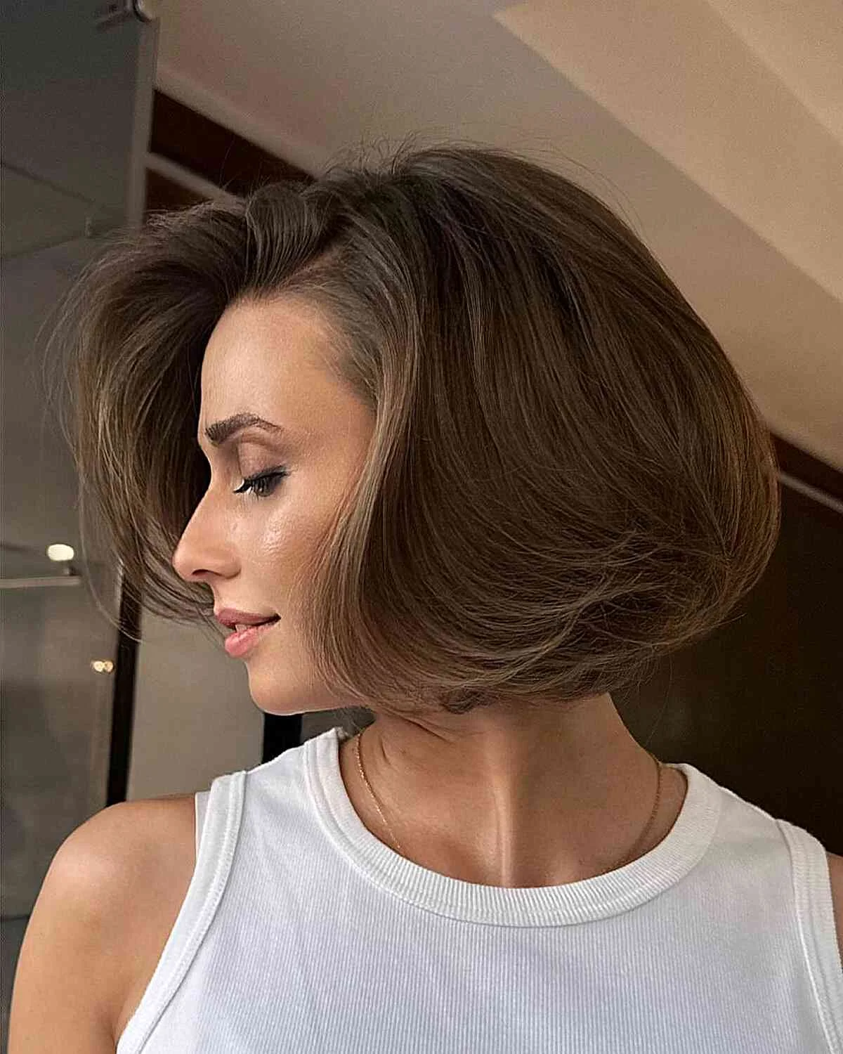 chin wavy chestnut bob shown as a thin hair bob idea