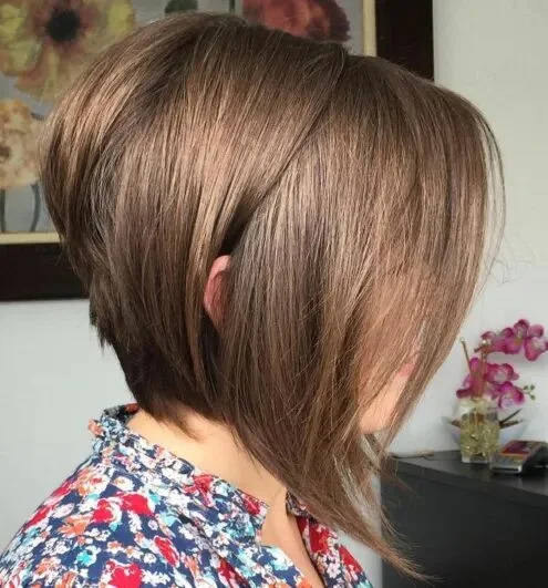 chin straight silver stacked bob shown as a thin hair bob idea, featuring volume through the low volume