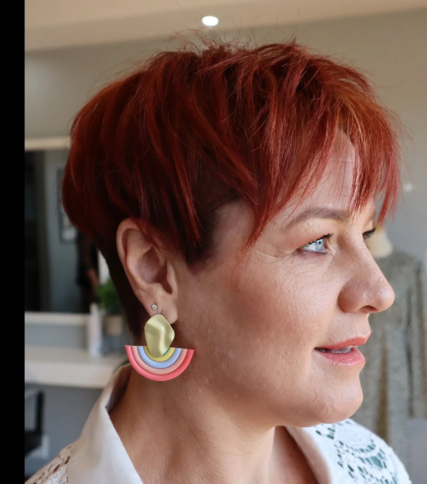 ear straight chestnut pixie with side swept fringe shown as a thin hairstyles for older women idea, featuring side swept fringe