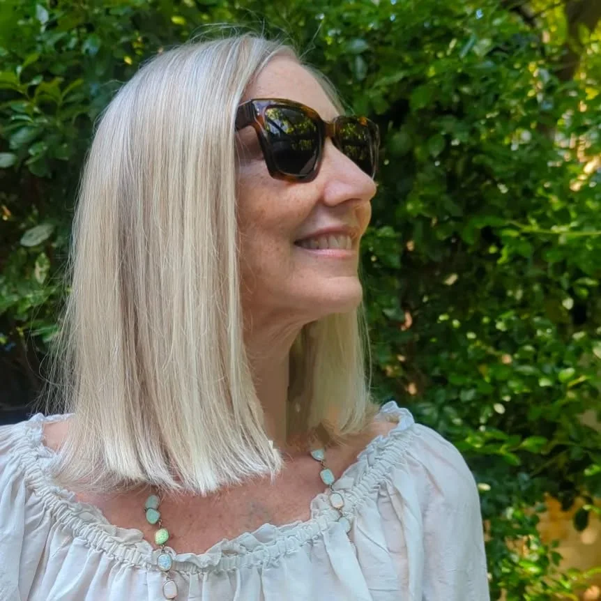 chin straight silver lob shown as a thin hairstyles for older women idea