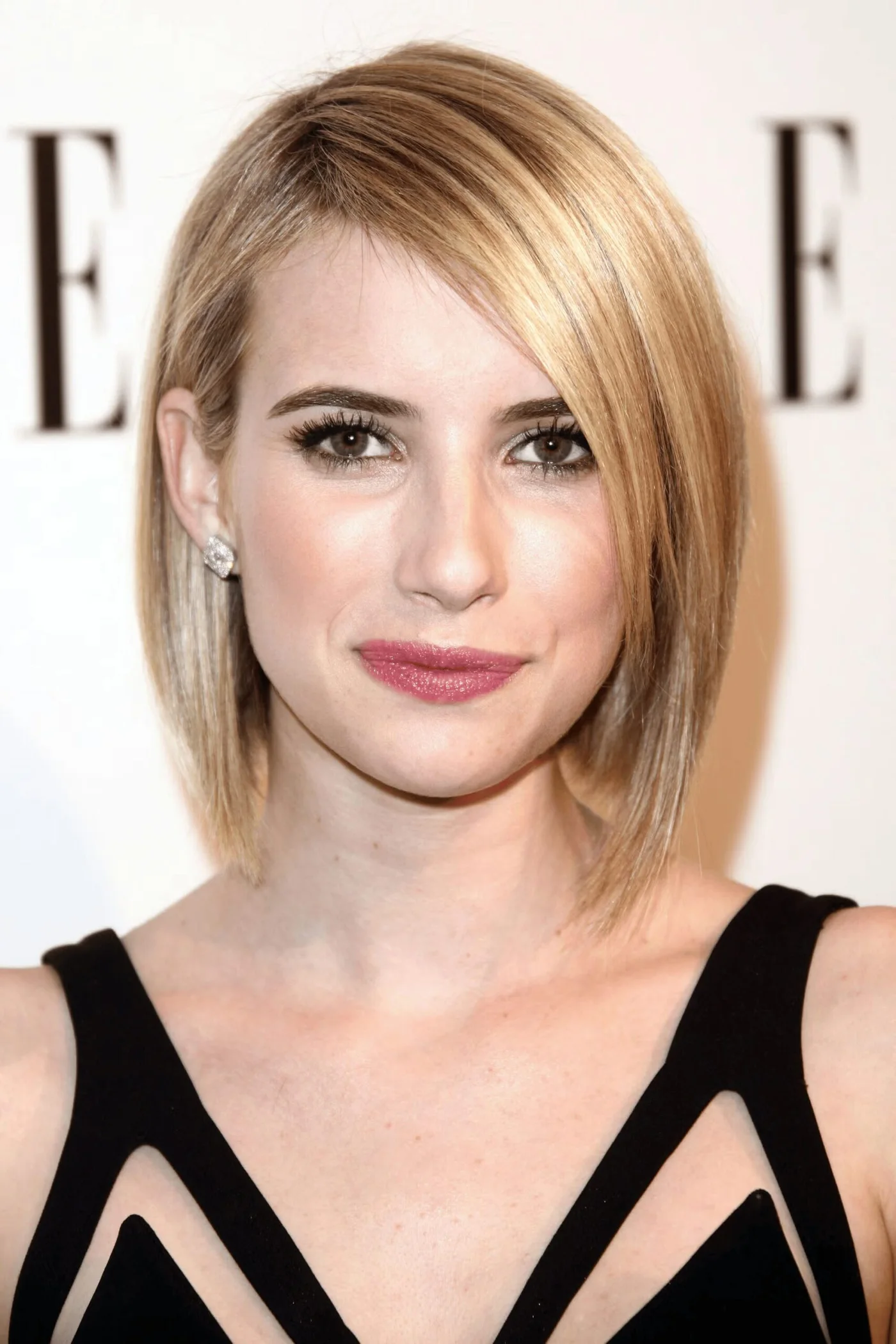 chin straight golden bob with side swept fringe shown as a thin hairstyles round face idea