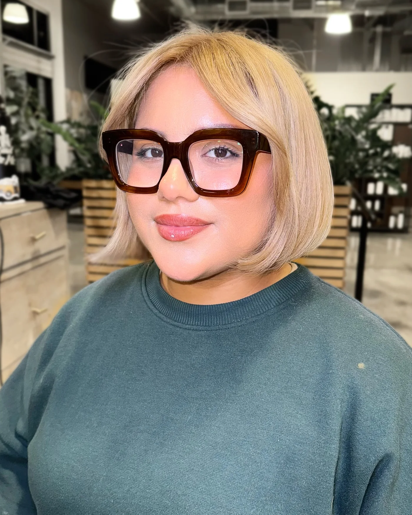 chin straight blonde bob shown as a thin hairstyles round face idea