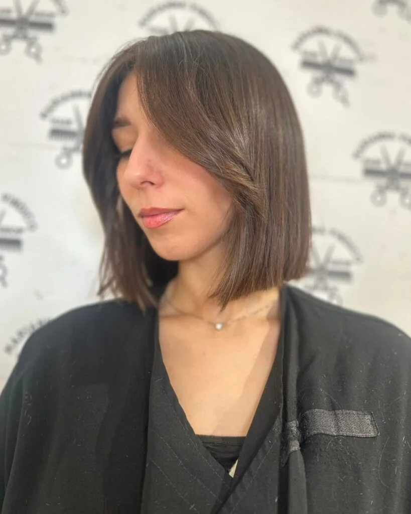 jaw straight chestnut bob shown as a thin hairstyles round face idea, featuring deep side part
