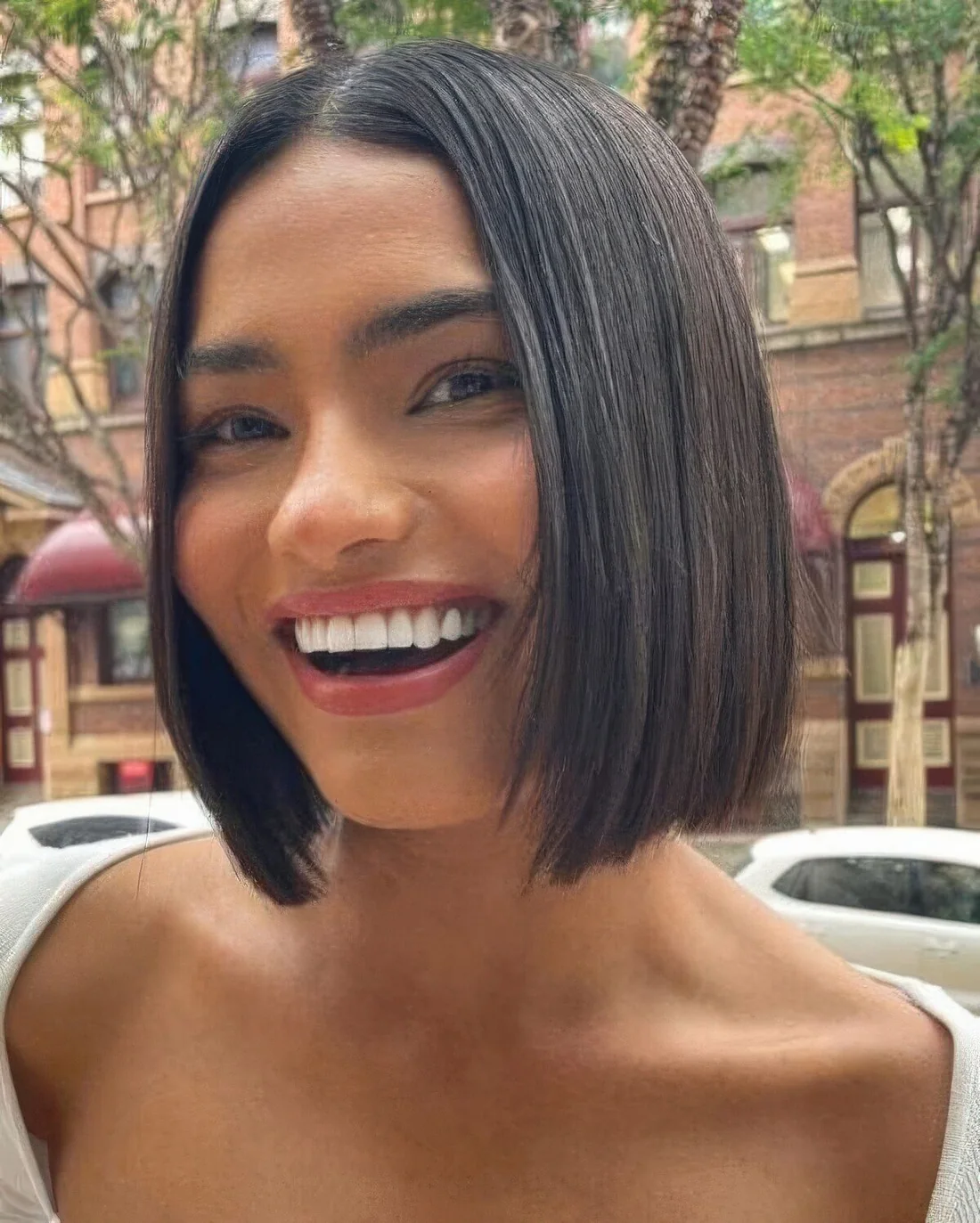 Center-parted side sleek blunt bob doesn't need any frills or extra touches as it's refined, chic flaterring itself.