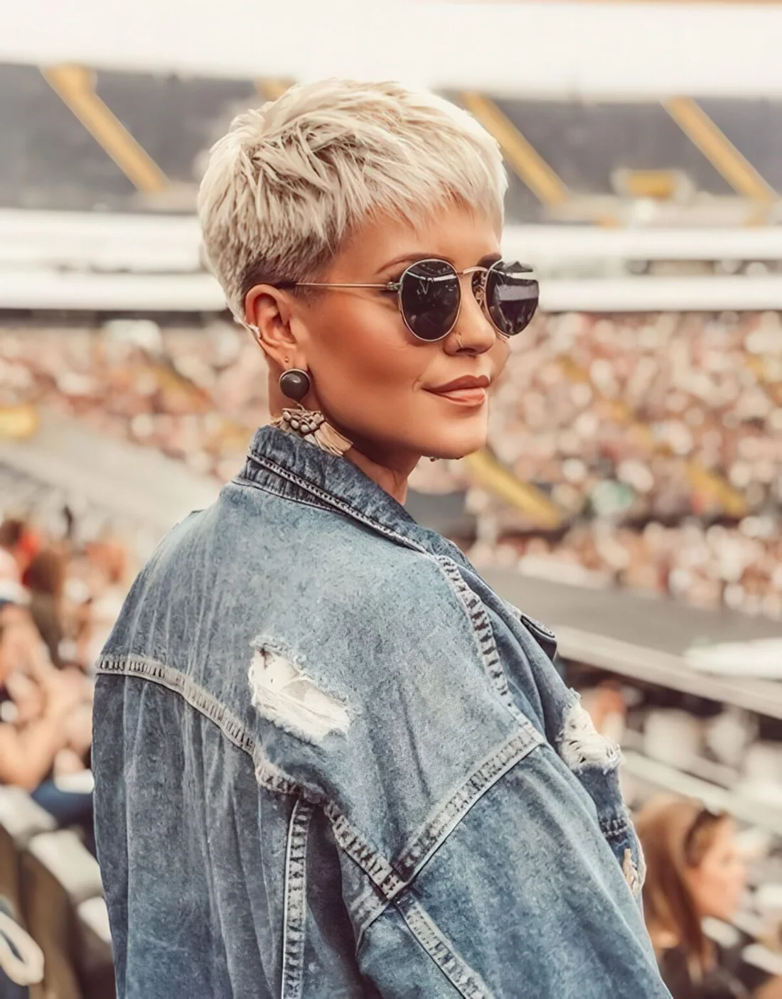 Styled blonde bowl haircut with plenty of layers and much texture.
