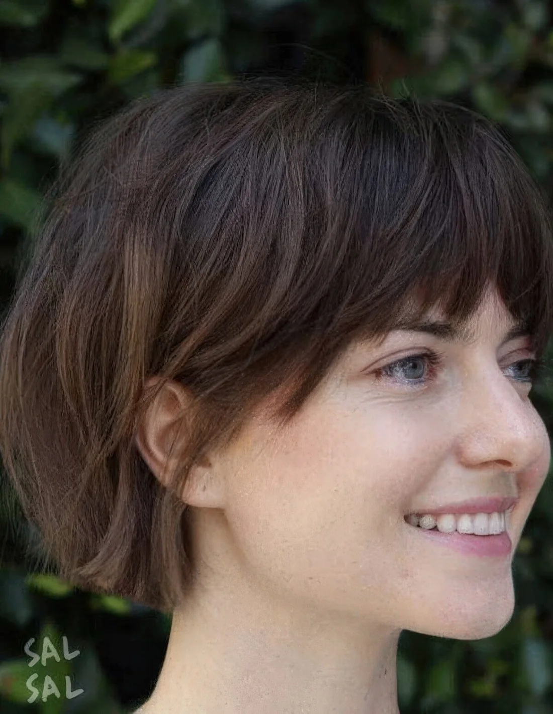 Photo showing choppy and curtain bangs, with the hairstyle clearly visible.