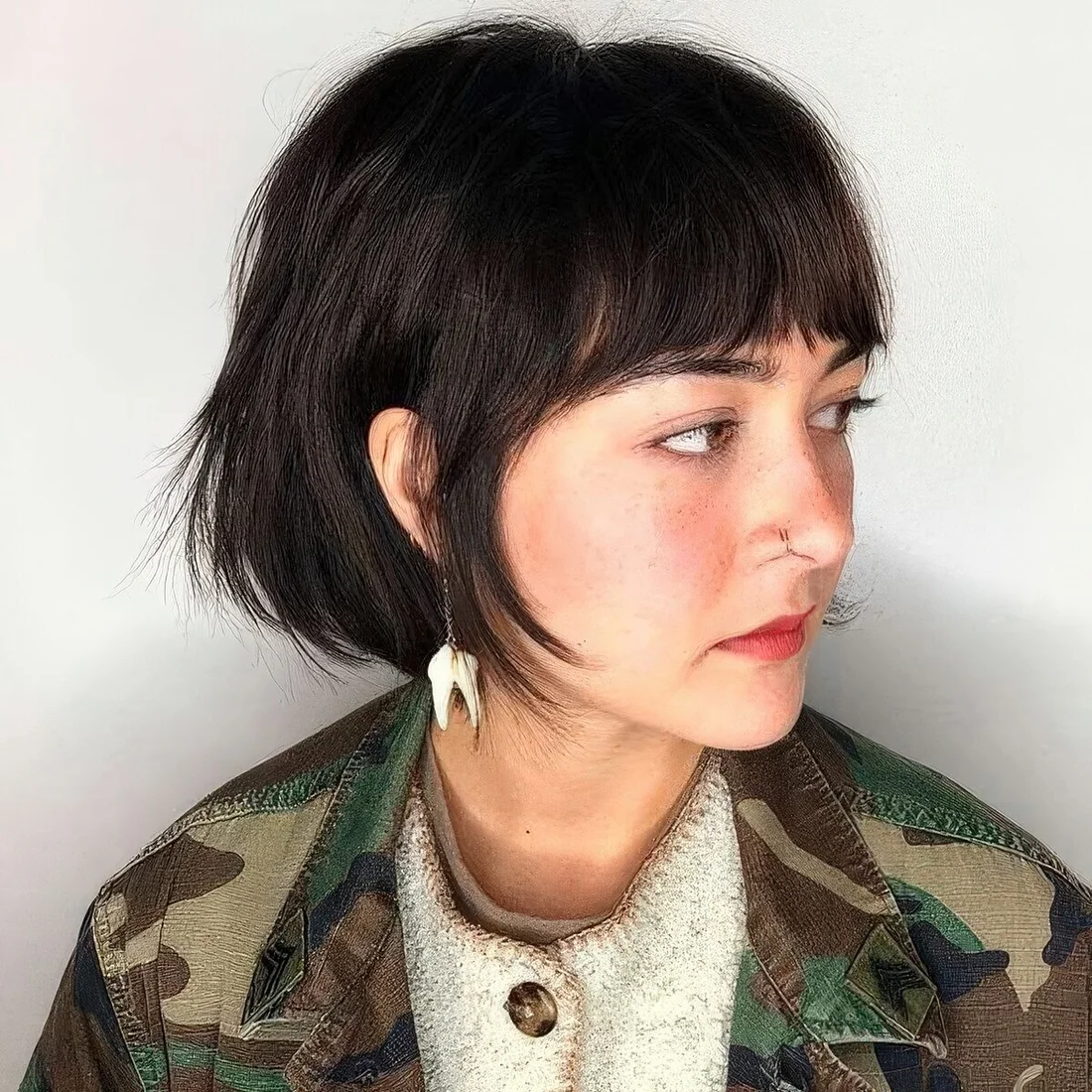 Photo showing choppy and curtain fringe, with the hairstyle clearly visible.