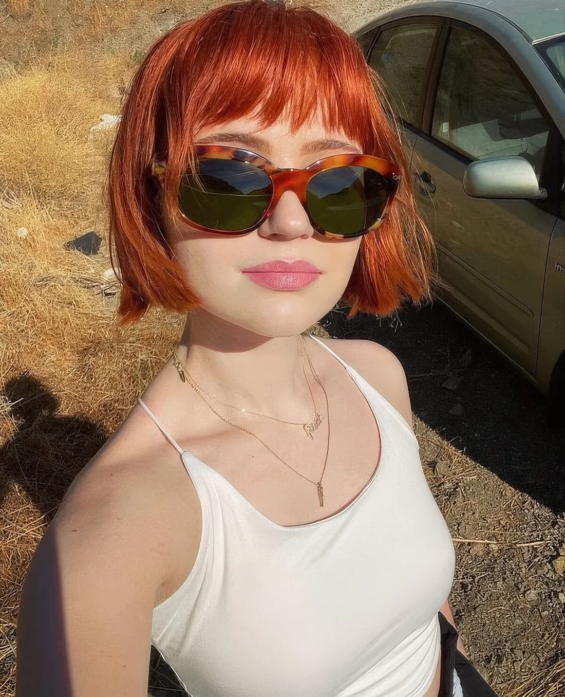 Curtain and choppy bangs short bob.