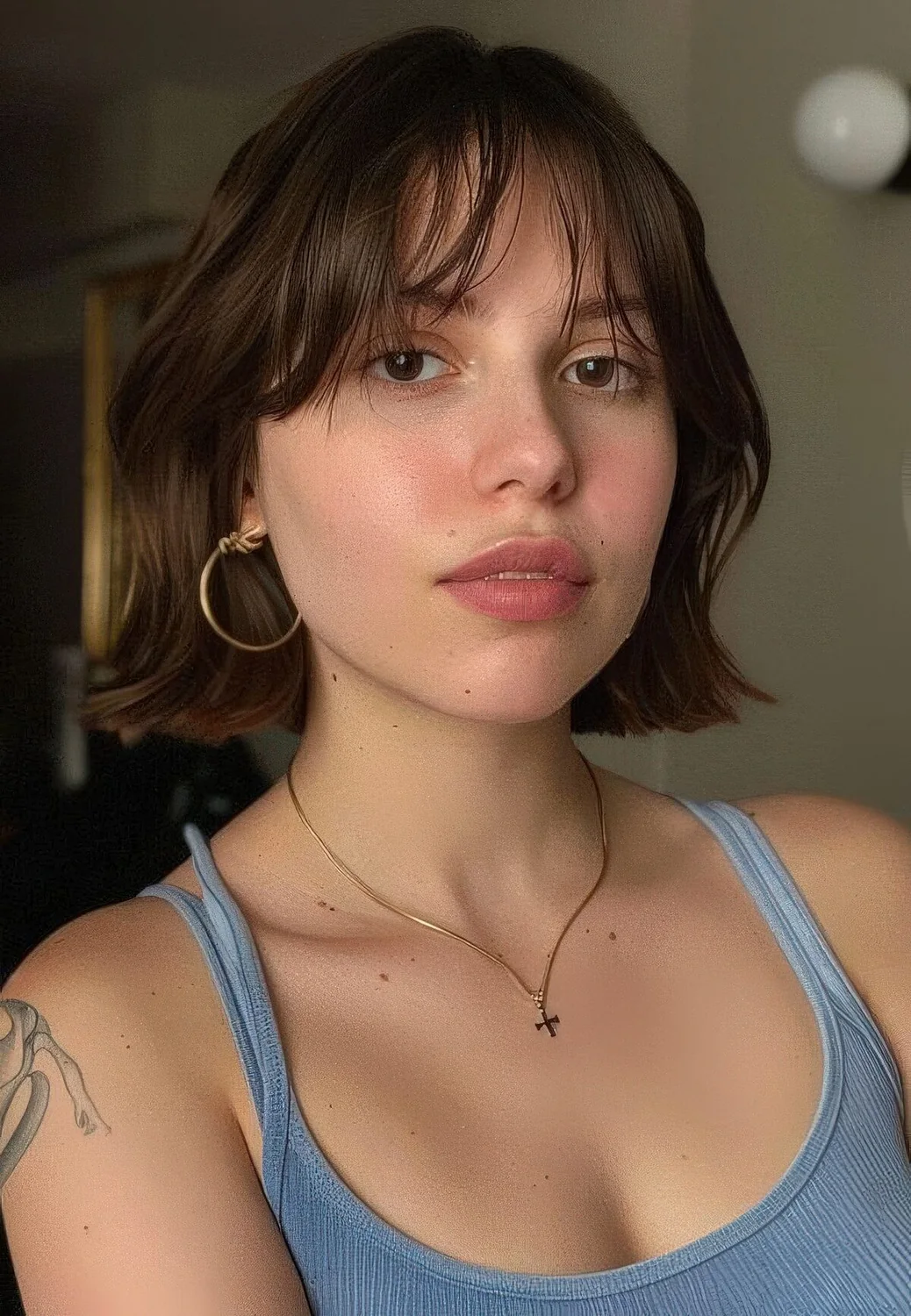 Photo showing wispy and curtain bangs, with the hairstyle clearly visible.