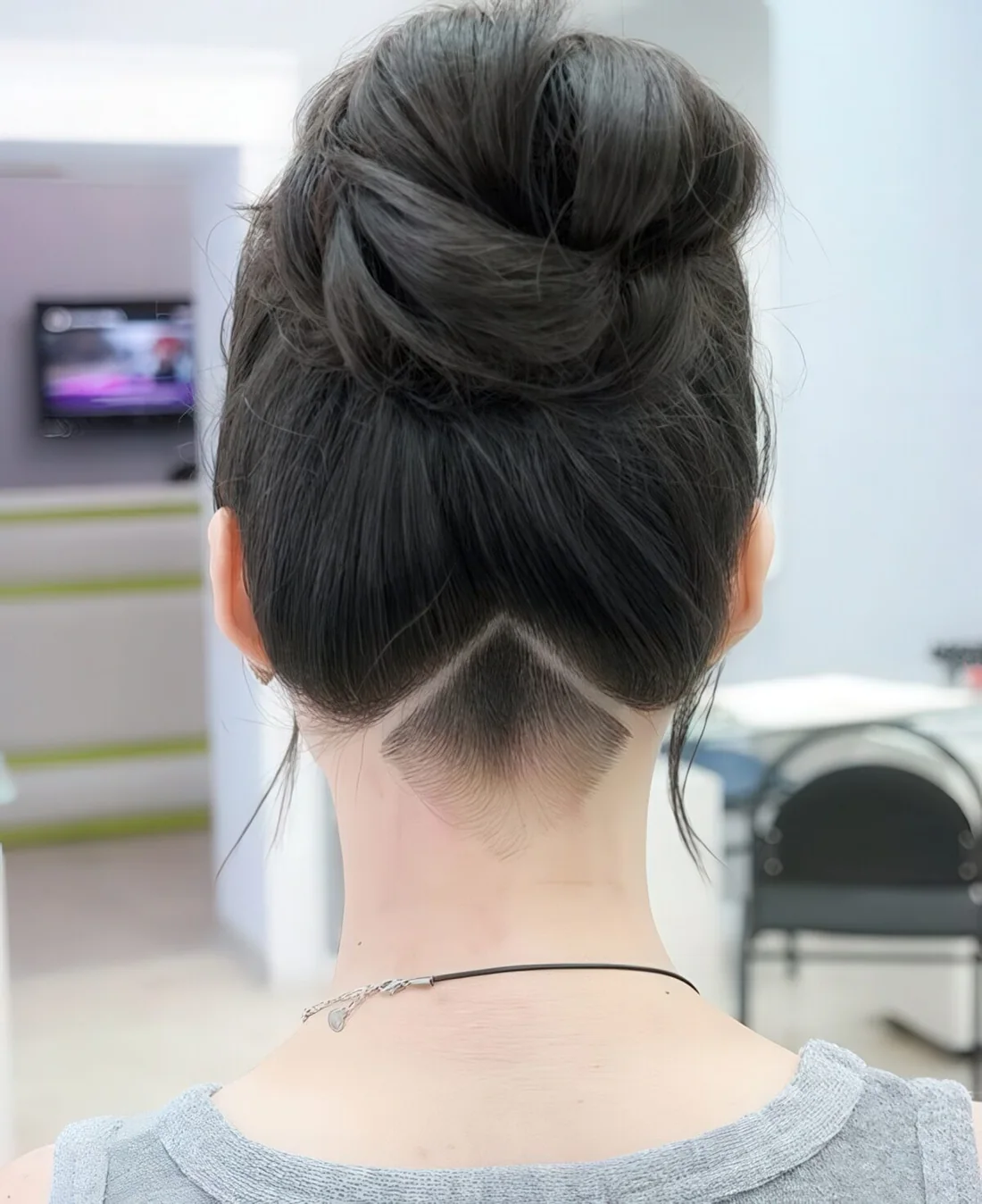 Simple, clean and very neat long undercut hairstyle for a chic look.