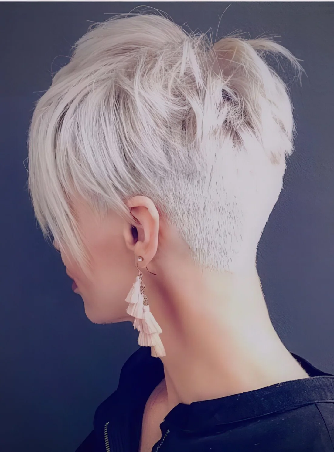 Photo showing ice blonde hairstyle, with the hairstyle clearly visible.