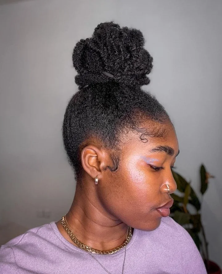 shoulder coily black bun shown as a updos for fine thin hair idea, featuring black color