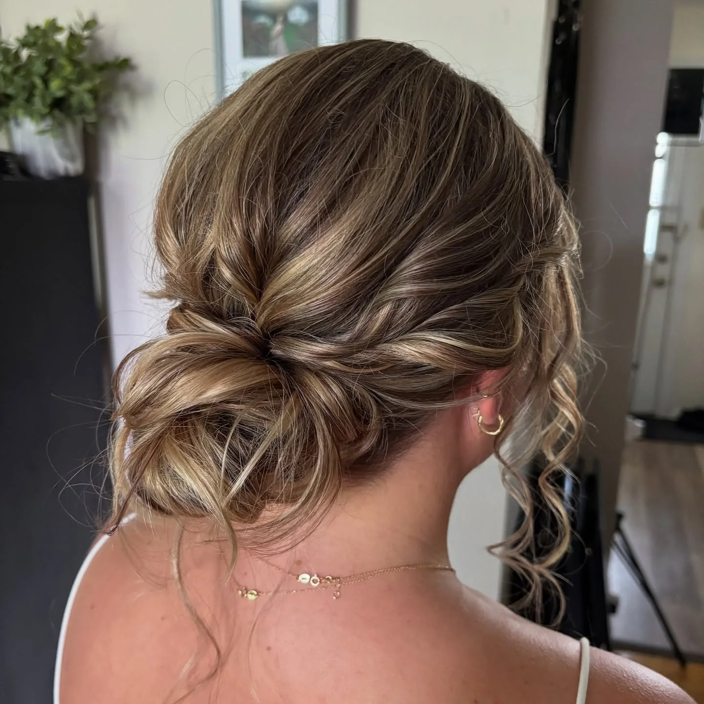 shoulder wavy blonde updo shown as a updos for fine thin hair idea, featuring volume through the crown