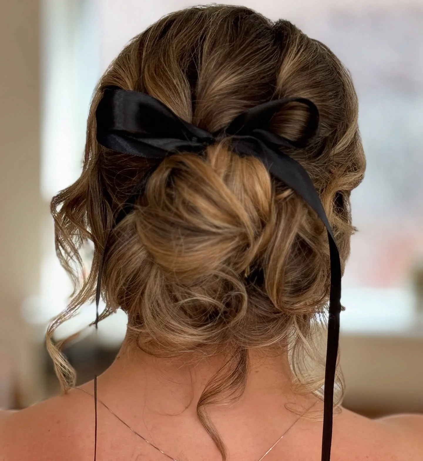 shoulder wavy blonde updo shown as a updos for fine thin hair idea, featuring wavy texture