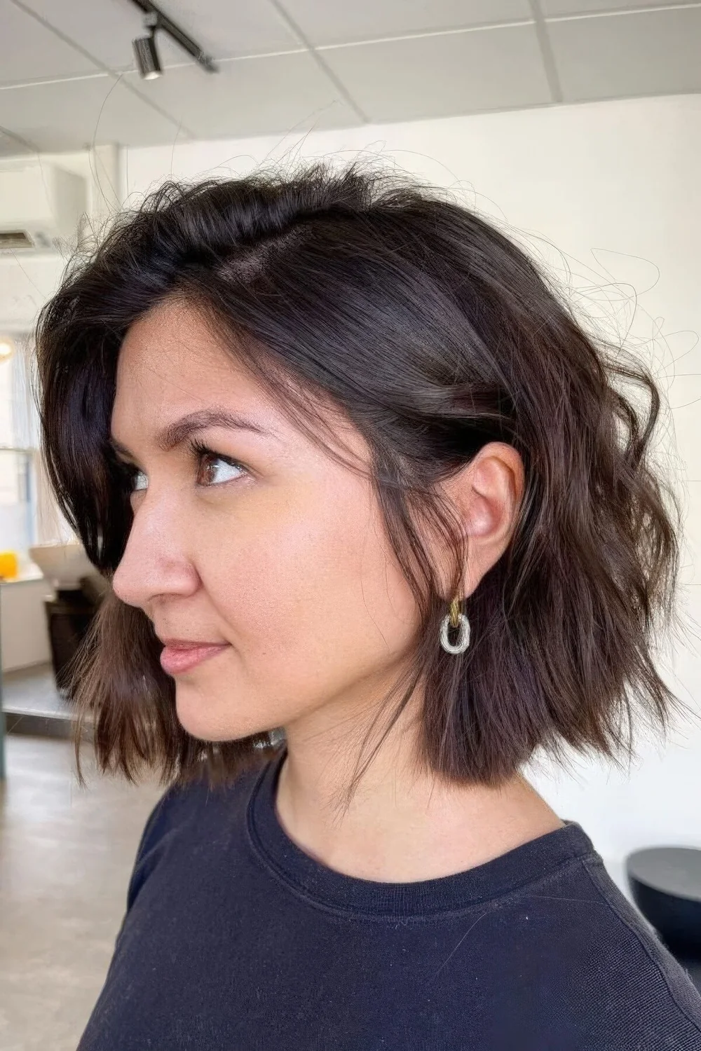 Photo showing cowgirl bob side part, with the hairstyle clearly visible.