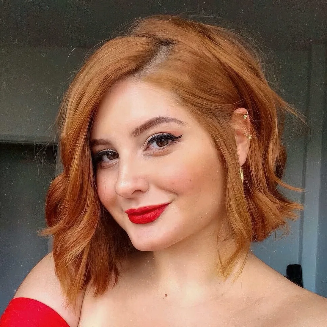 Photo showing ginger bob waves, with the hairstyle clearly visible.