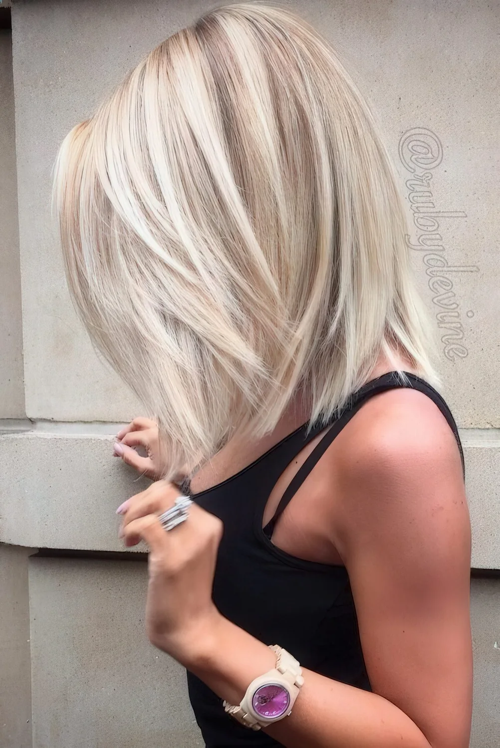Long bob with icy blonde balayage and blonde highlights plus some volume.