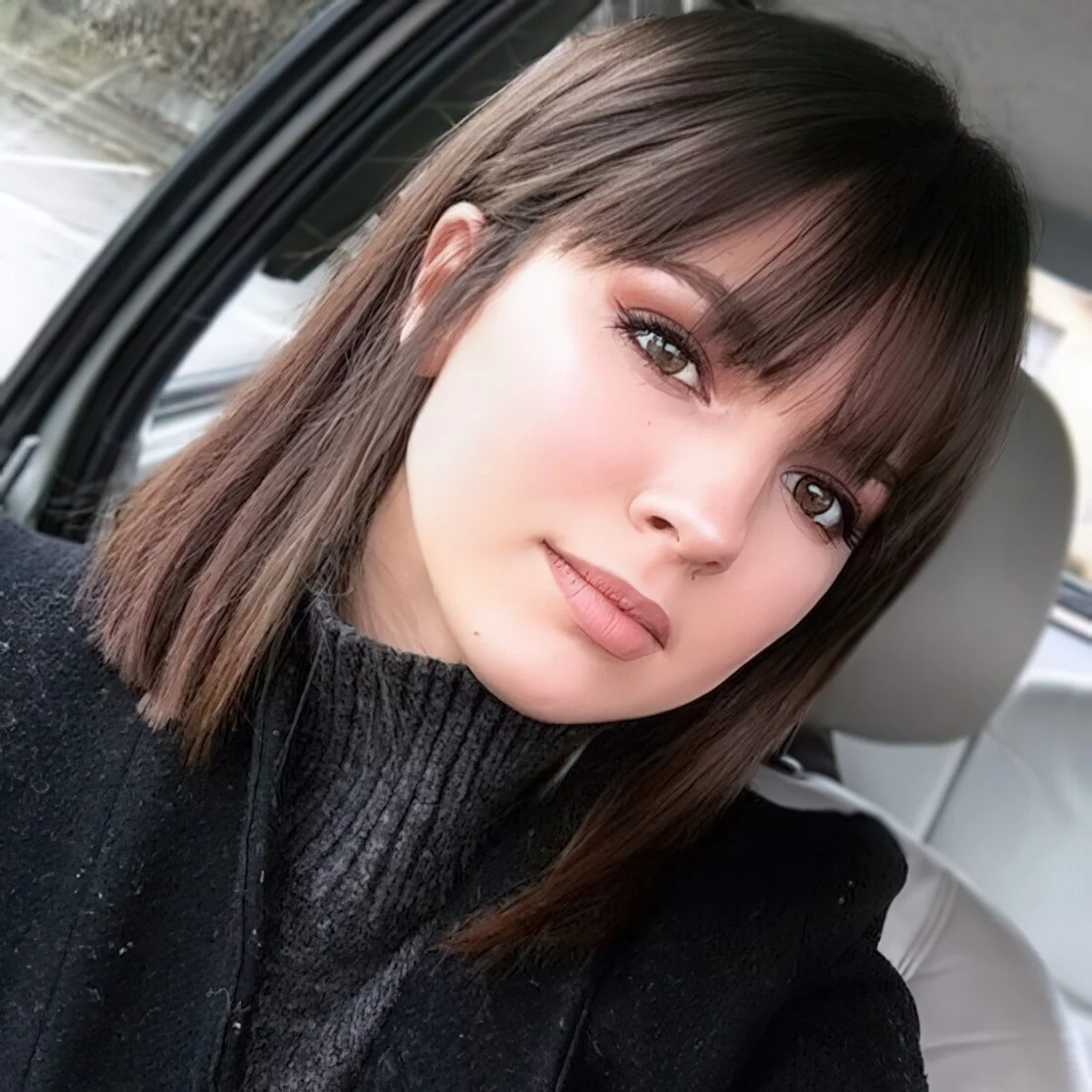 Long straight bob with a classic long fringe.