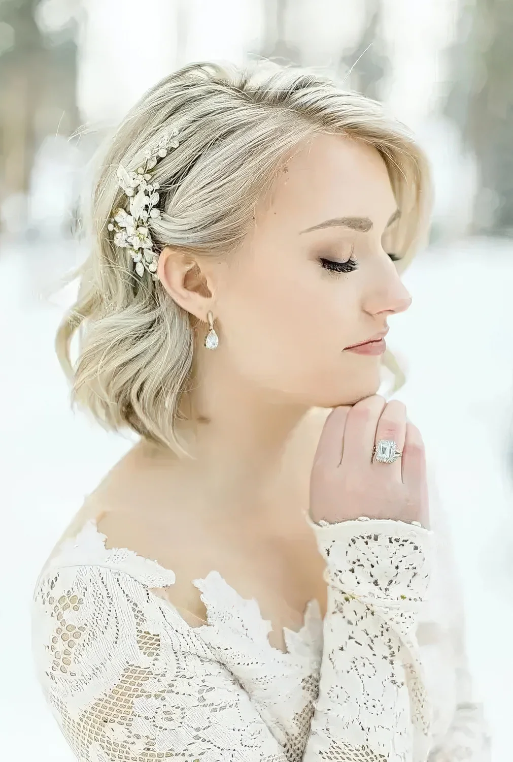 Long blonde bob with a lovely crystal hair pin.