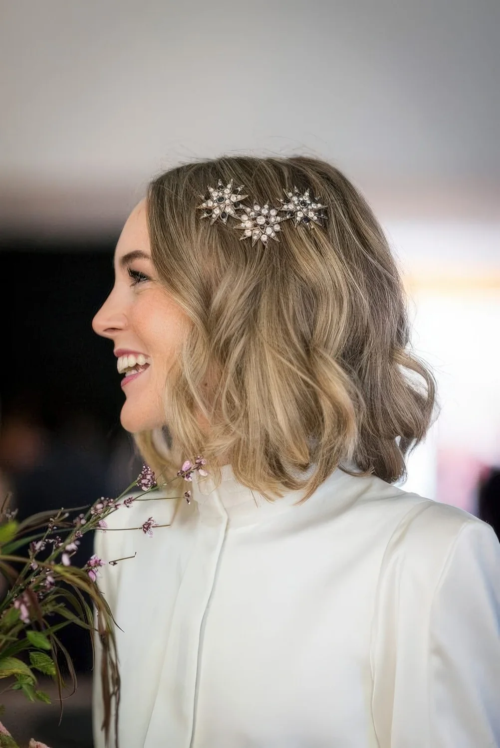 Wavy long bob accented with shine rhinestone stars.