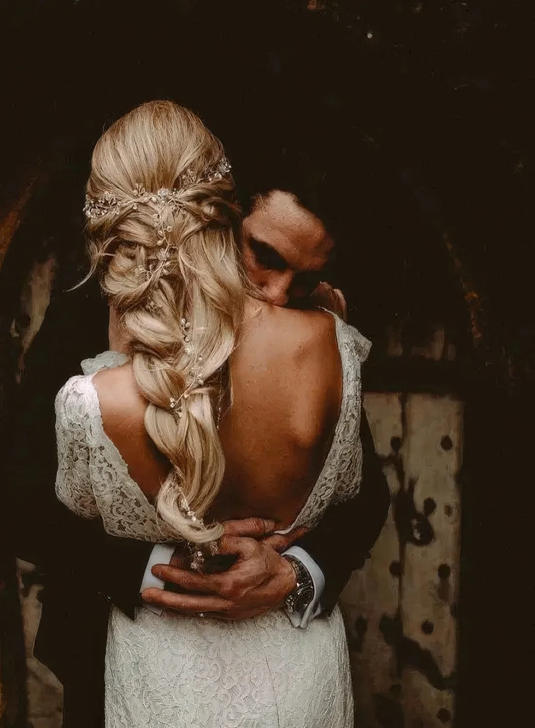Loose braid with twisted elements and a beautiful bead and pearl hair vine.