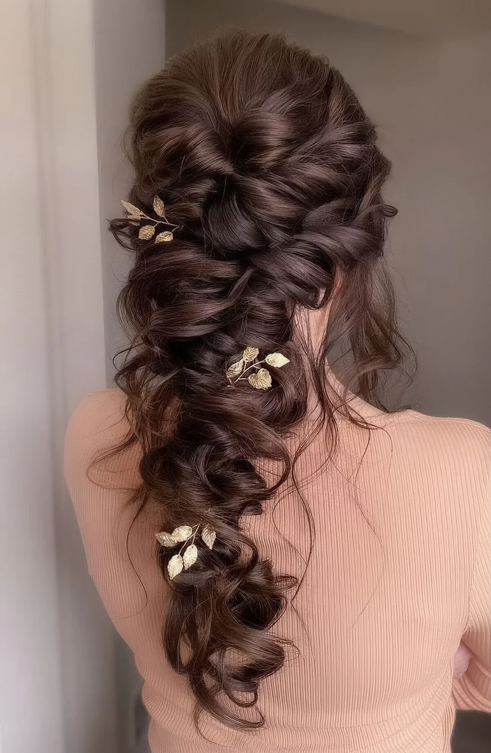 Glam loose twisted braid plus gold leaves.