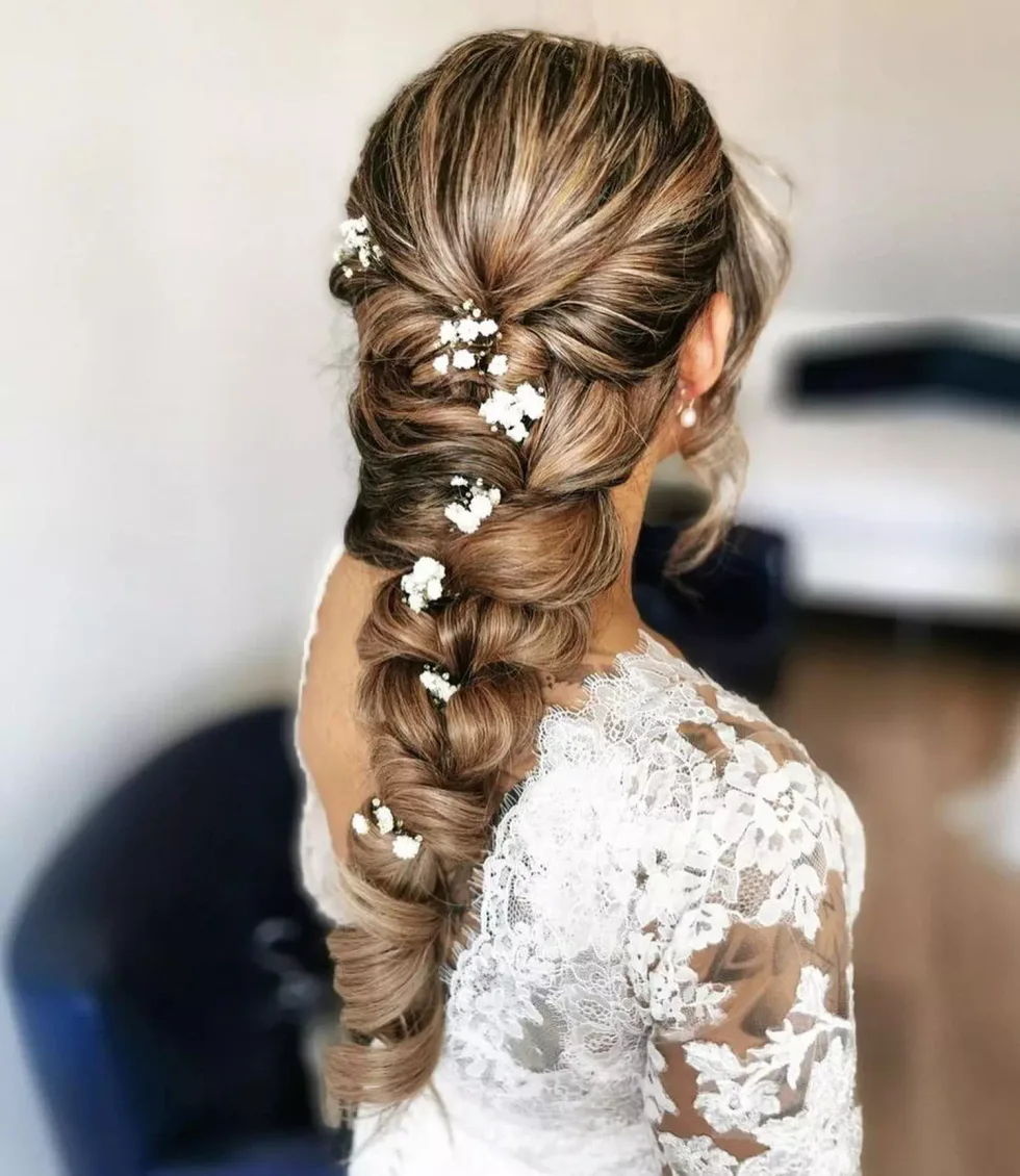 chest wavy blonde ponytail shown as a wedding hairstyles ideas for long hair idea, featuring chest outline